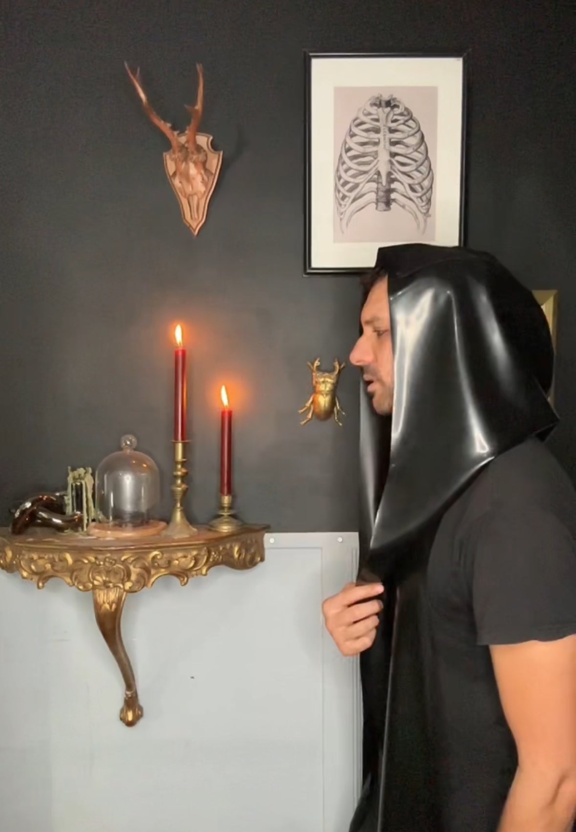 Detail of the long wrappable sides on the one-size unisex latex hood