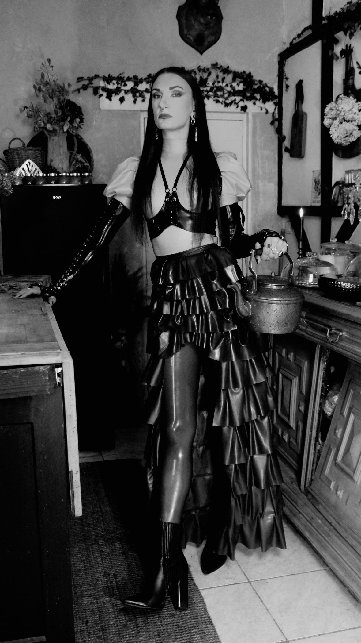 Styling of the customisable cupless latex harness bra with crossover strap detail