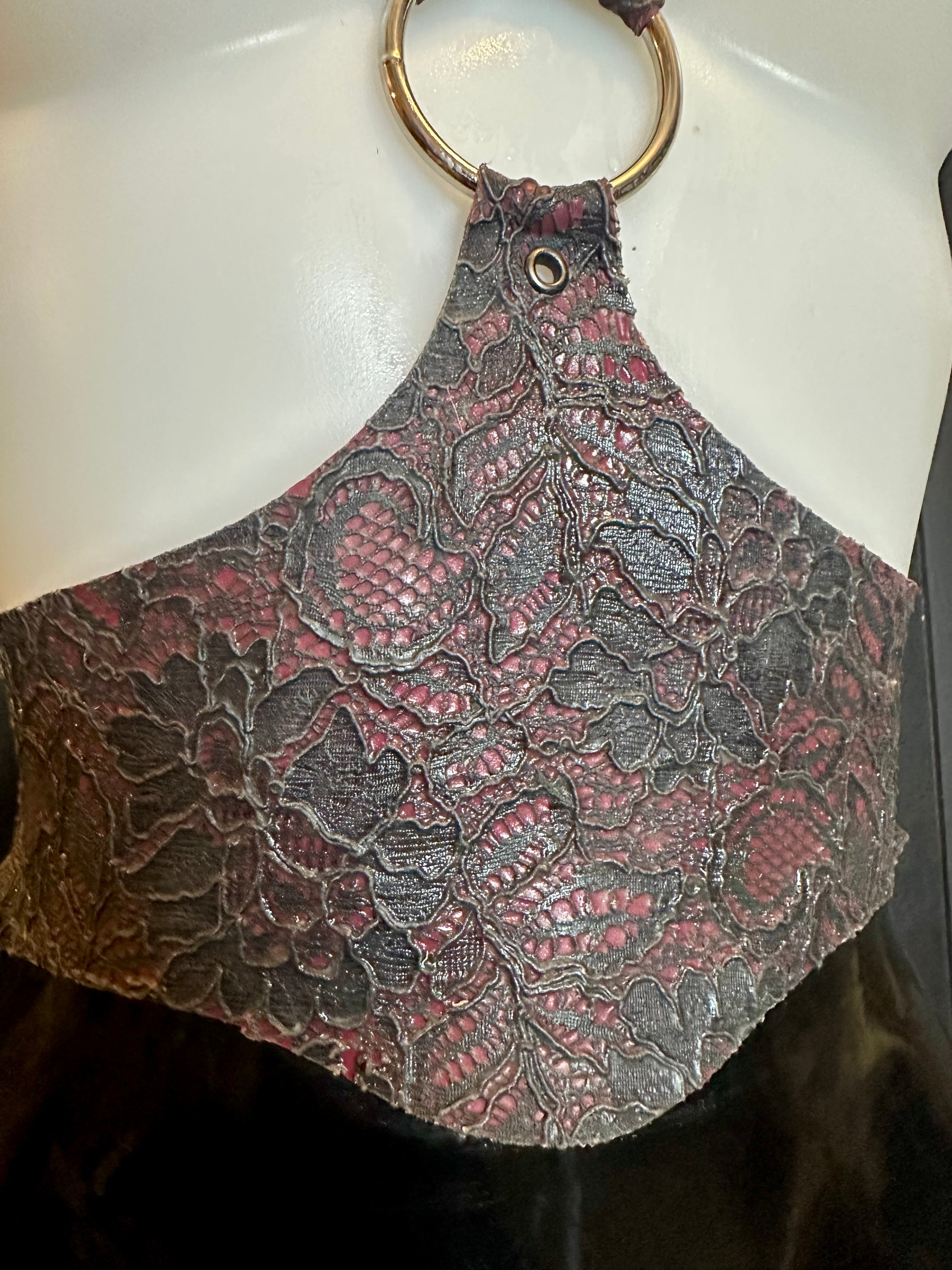 Texture detail of the latex-lace on the cinched harness sample