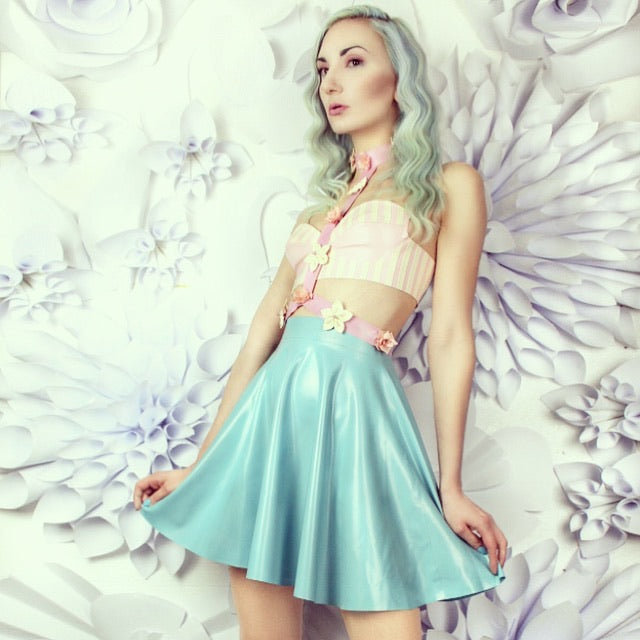 Close detail of the smooth latex finish on the skater mini skirt