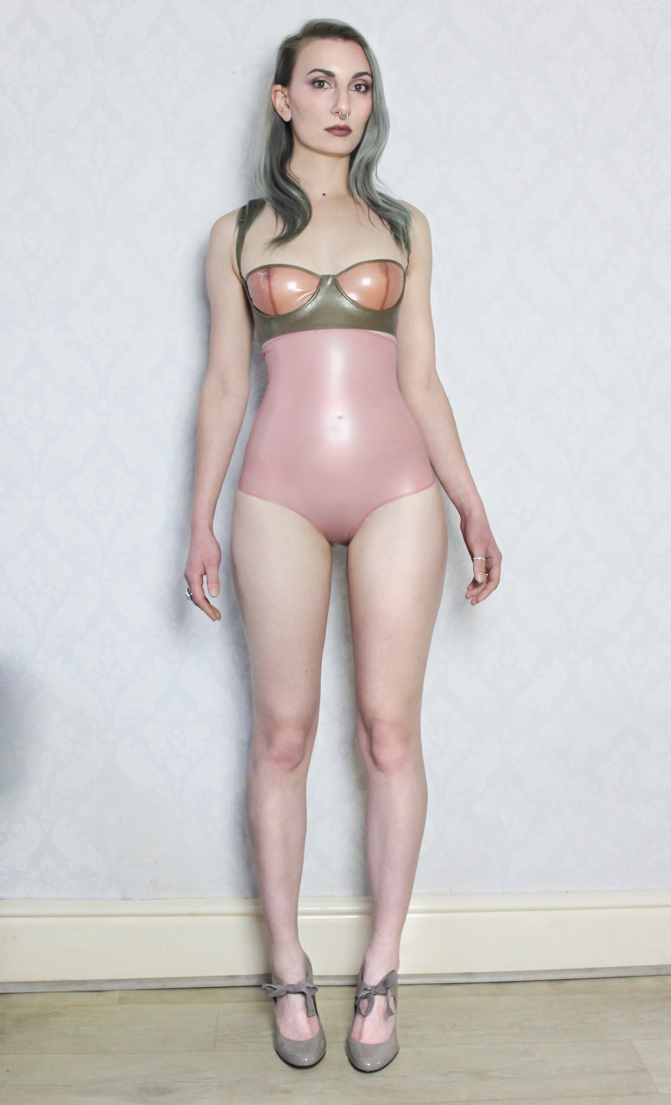 Close detail of the contrast coloured cups on the latex balconette bra