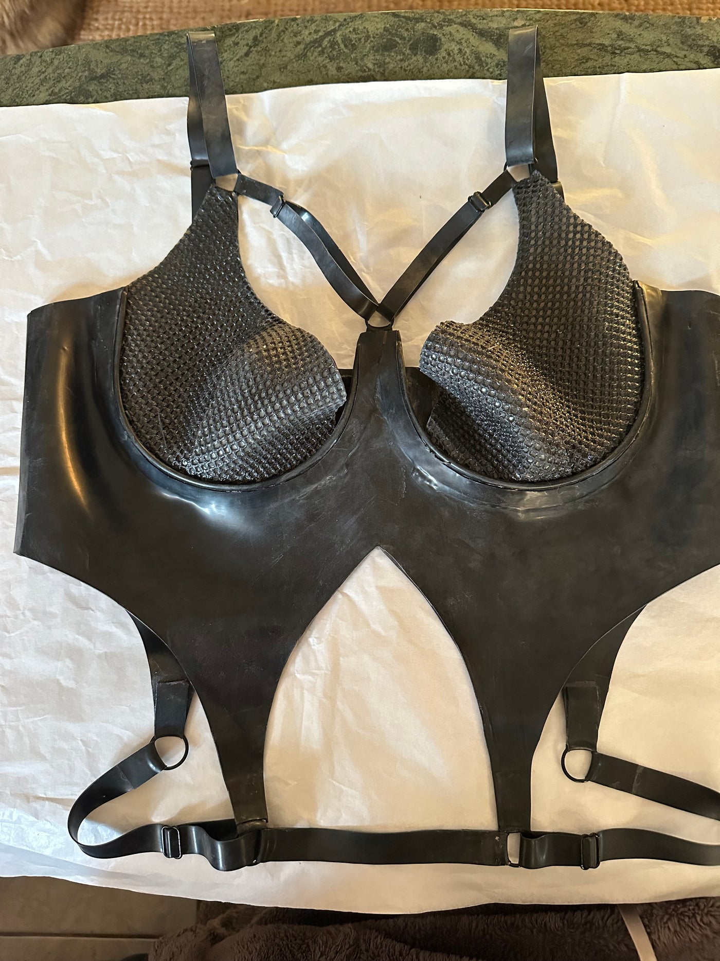 Detail of the hook and eye tape seams on the openable latex-net cups