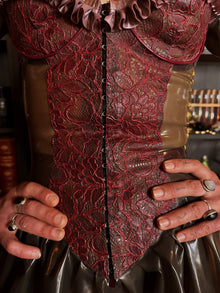 Fit detail of the waist-cinching contoured Spring latex dress