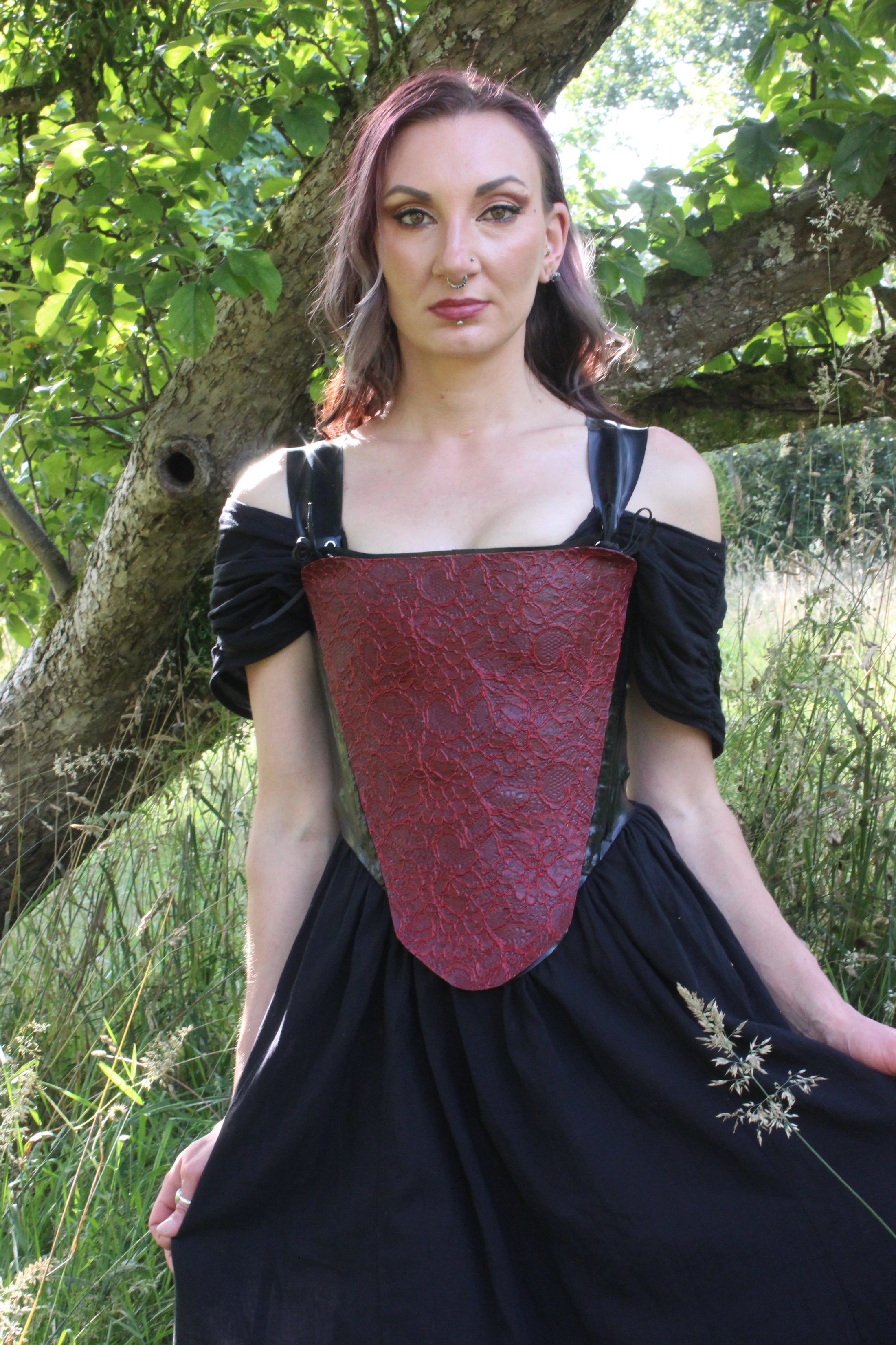 Close detail of the signature latex-lace on the Elizabethan corset panel