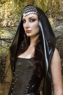 Styling of the latex wrap hood with dramatic long wrapping sides