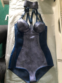Eustratia V-strap latex bodysuit in nightshade blue with blue and gold glittermesh accent panels