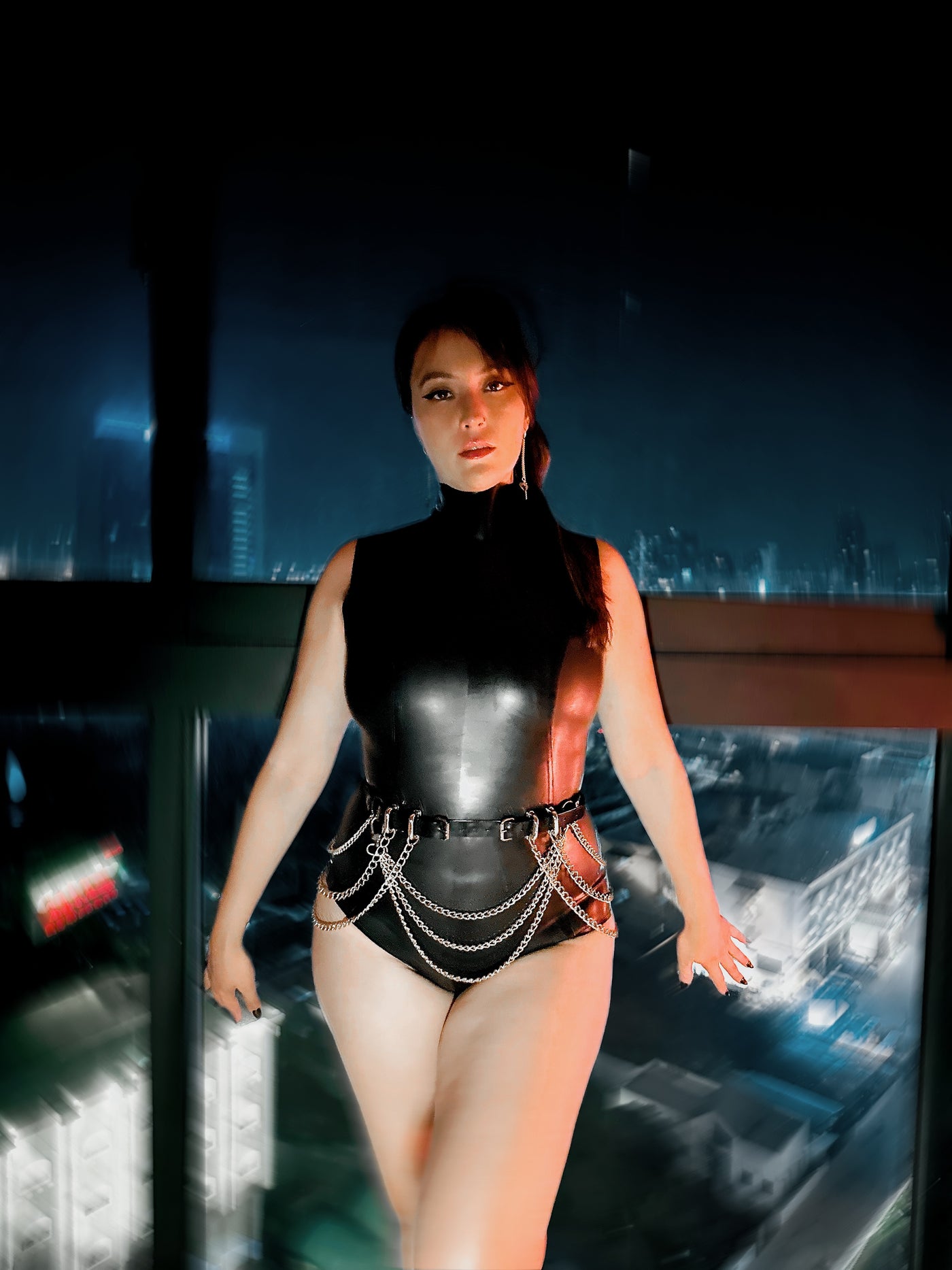 Eustratia sleeveless high-neck latex bodysuit with keyhole back detail in translucent black
