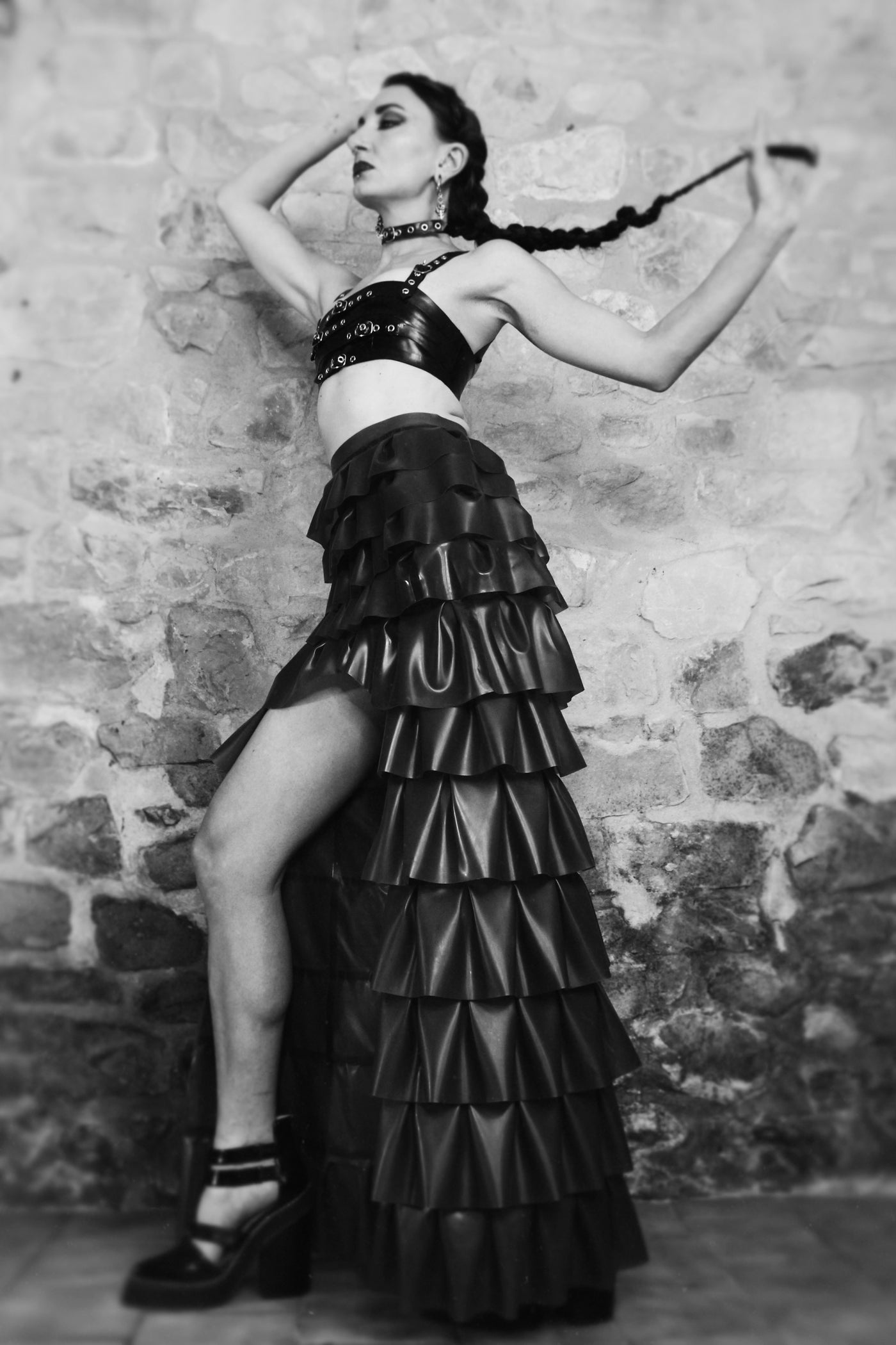 Eustratia Temperance latex ruffle skirt with hand-pleated layers and a dramatic high-low hem