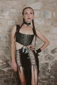 Detail of the back zip and laced panels on the Lilith latex skirt