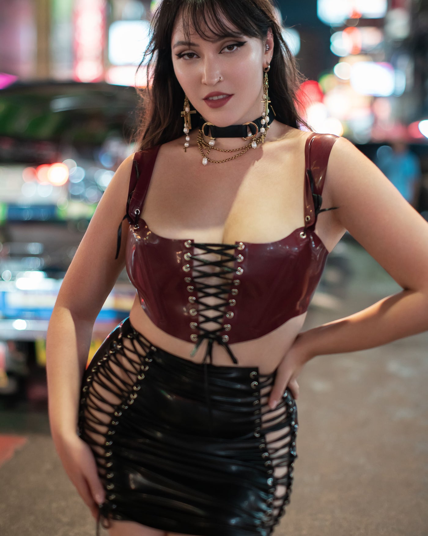 Detail of the lace-up back closure on the cropped latex corset top