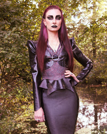 Close detail of the translucent smokey black latex-net panel on the pencil skirt