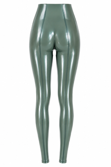 Close detail of the engineered back seam placement on the latex leggings