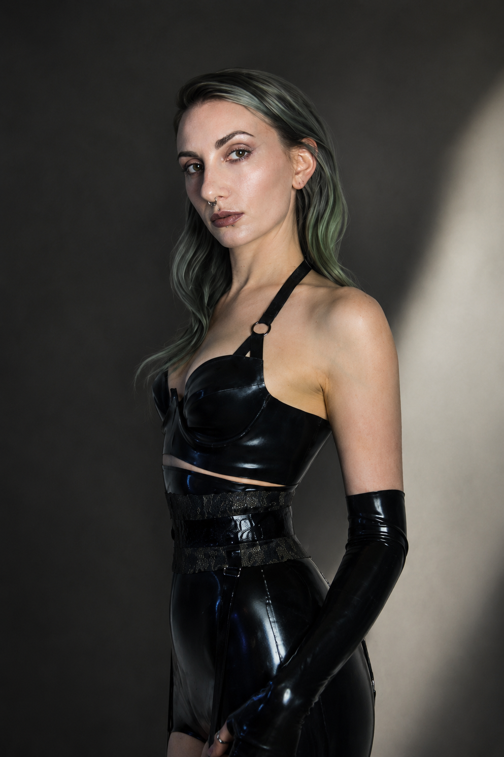 Styling detail of the versatile high waisted low leg latex briefs