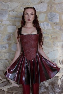 Close detail of the two-tone striped design on the latex skater skirt