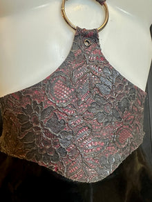 Texture detail of the latex-lace on the cinched harness sample