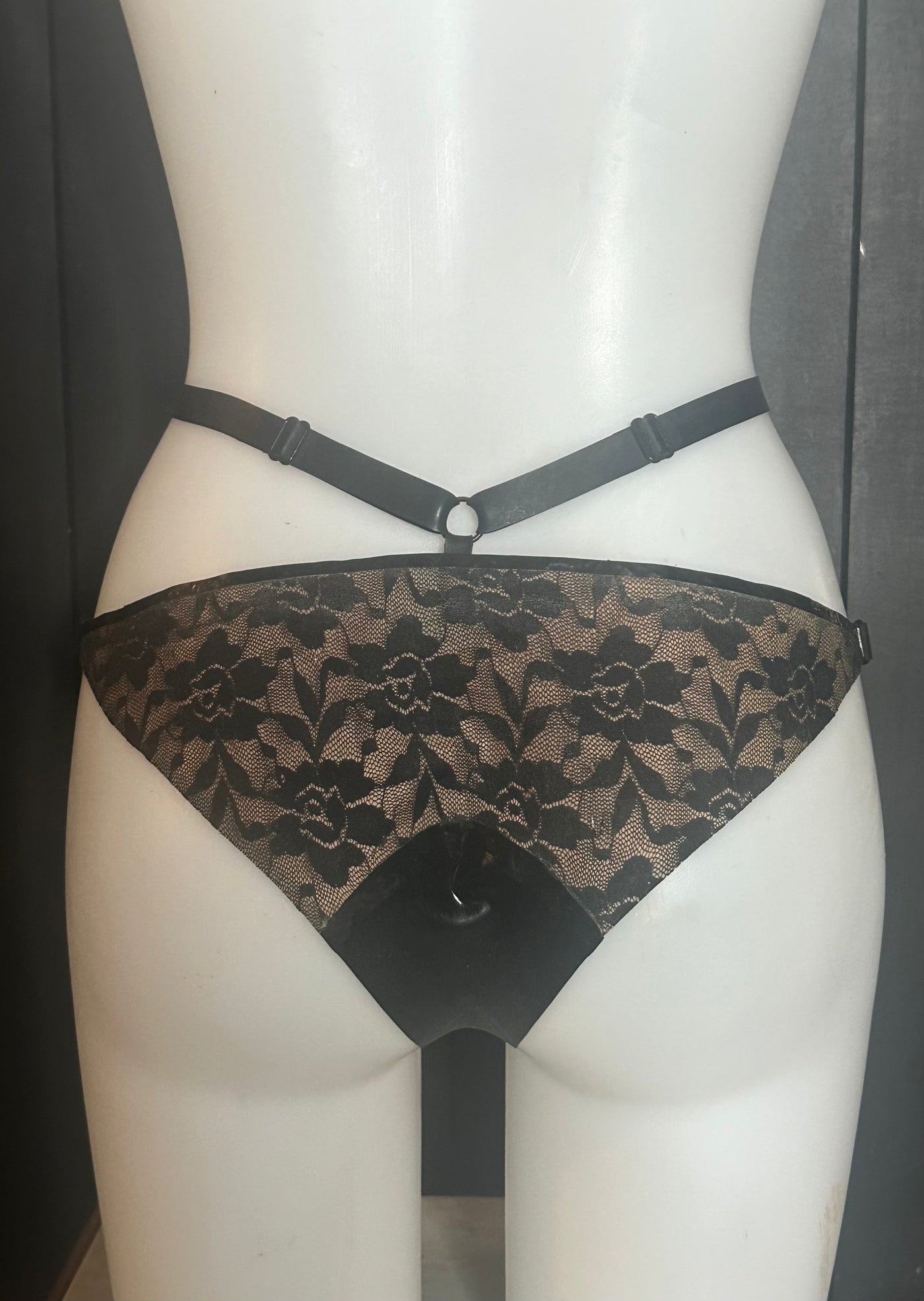 Detail of the latex-lace pattern on the adjustable mini briefs sample