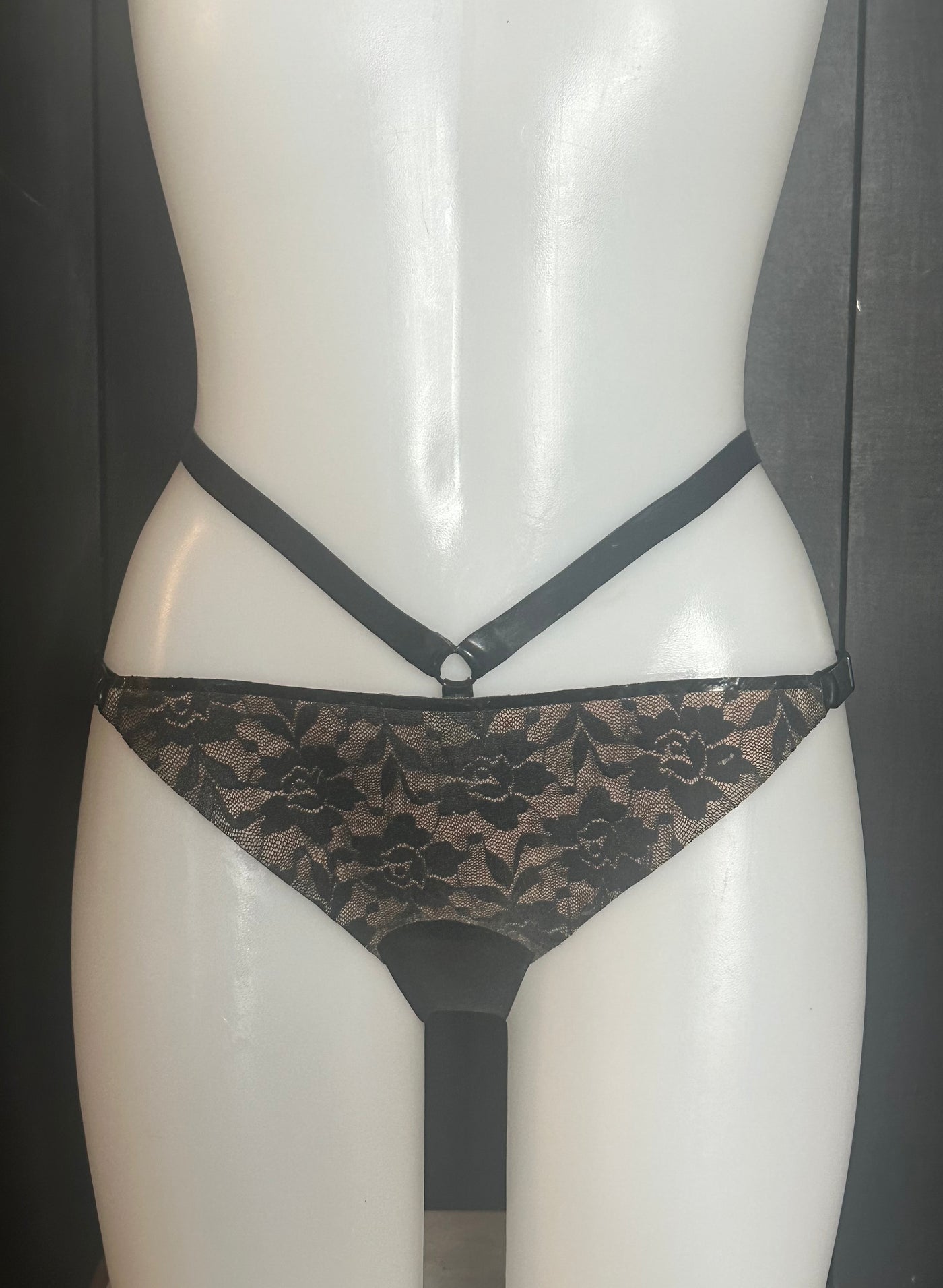 Eustratia latex-lace mini briefs sample in an adjustable fit with lace pattern