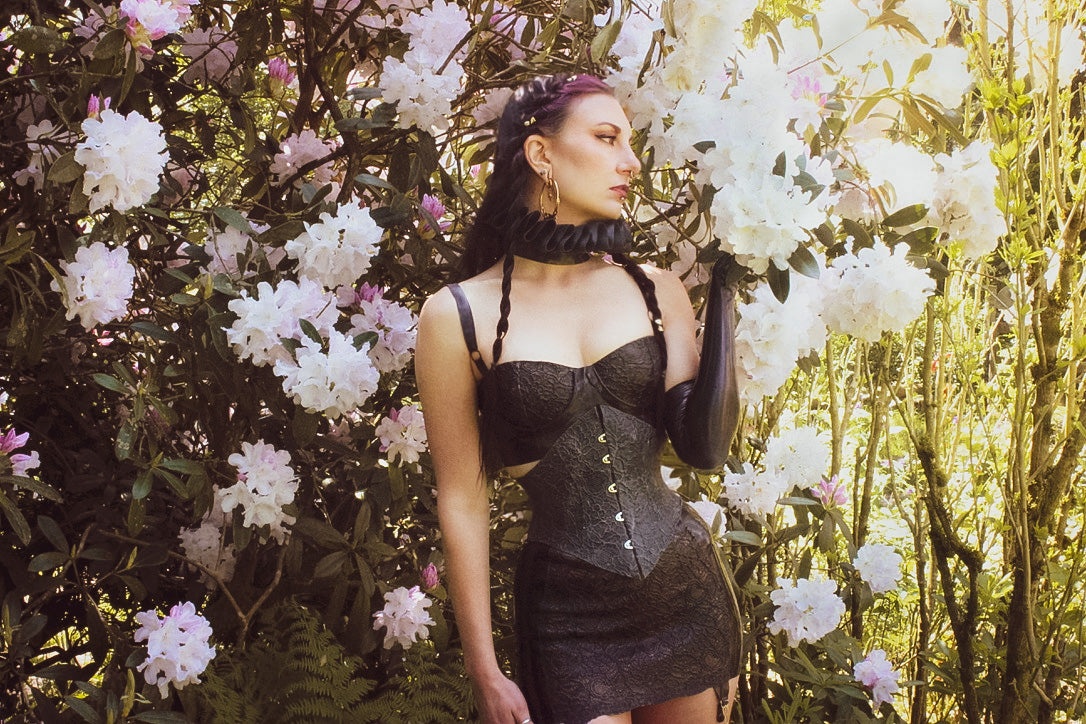Texture detail of the signature latex-lace cups on the balconette bra