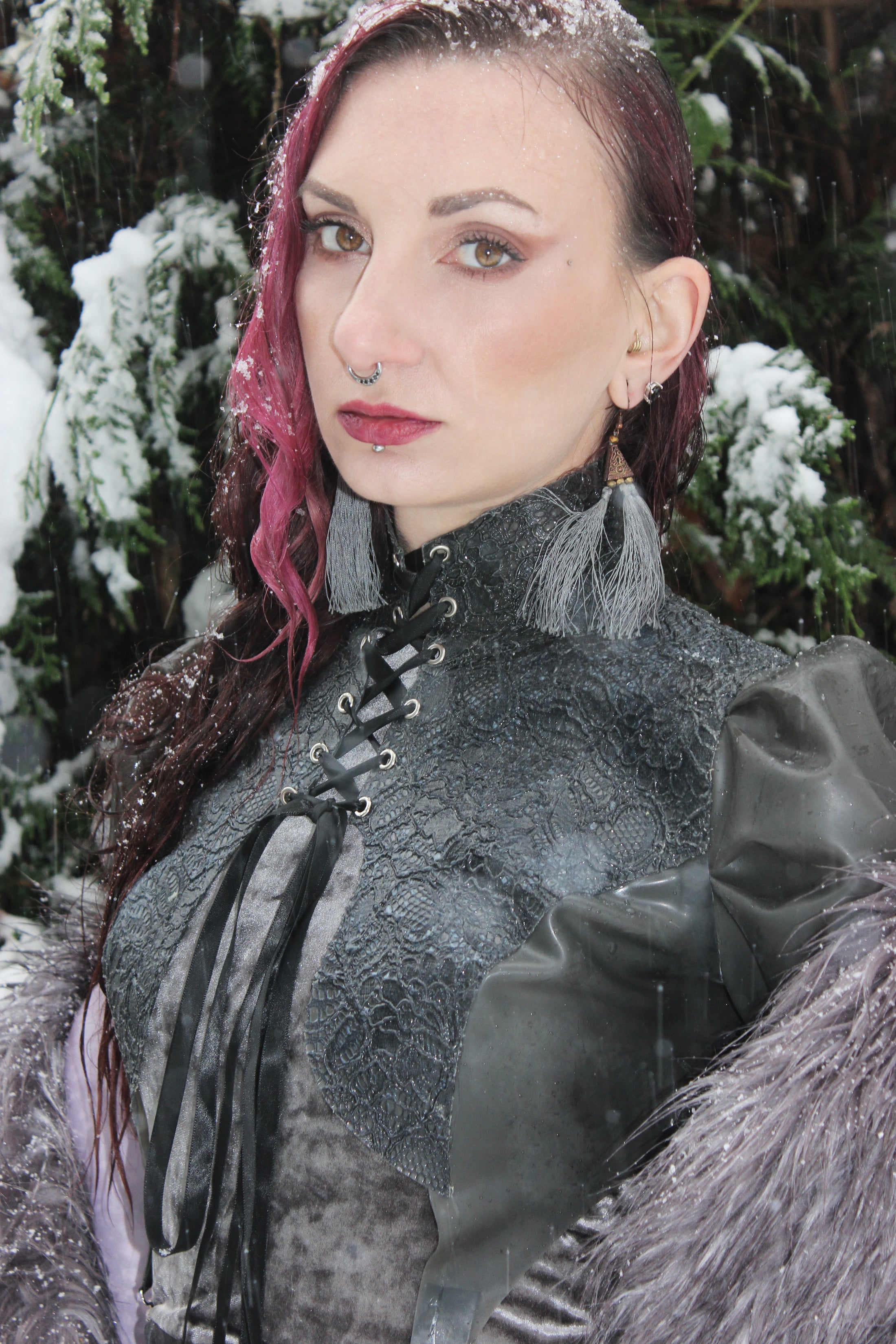 Detail of the back lace-up closure on the Lilith latex-lace top