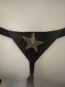 Styling of the celestial glitter-mesh latex bikini showing its fully adjustable fit