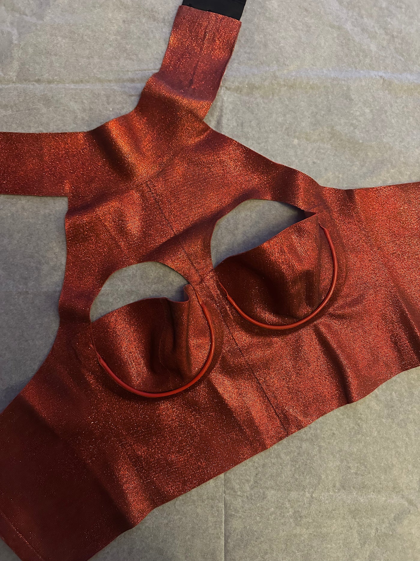 Red glitter-mesh latex cropped top with slightly adjustable back, festive party style