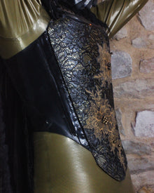 Close detail of the Empress latex front panel texture and finish