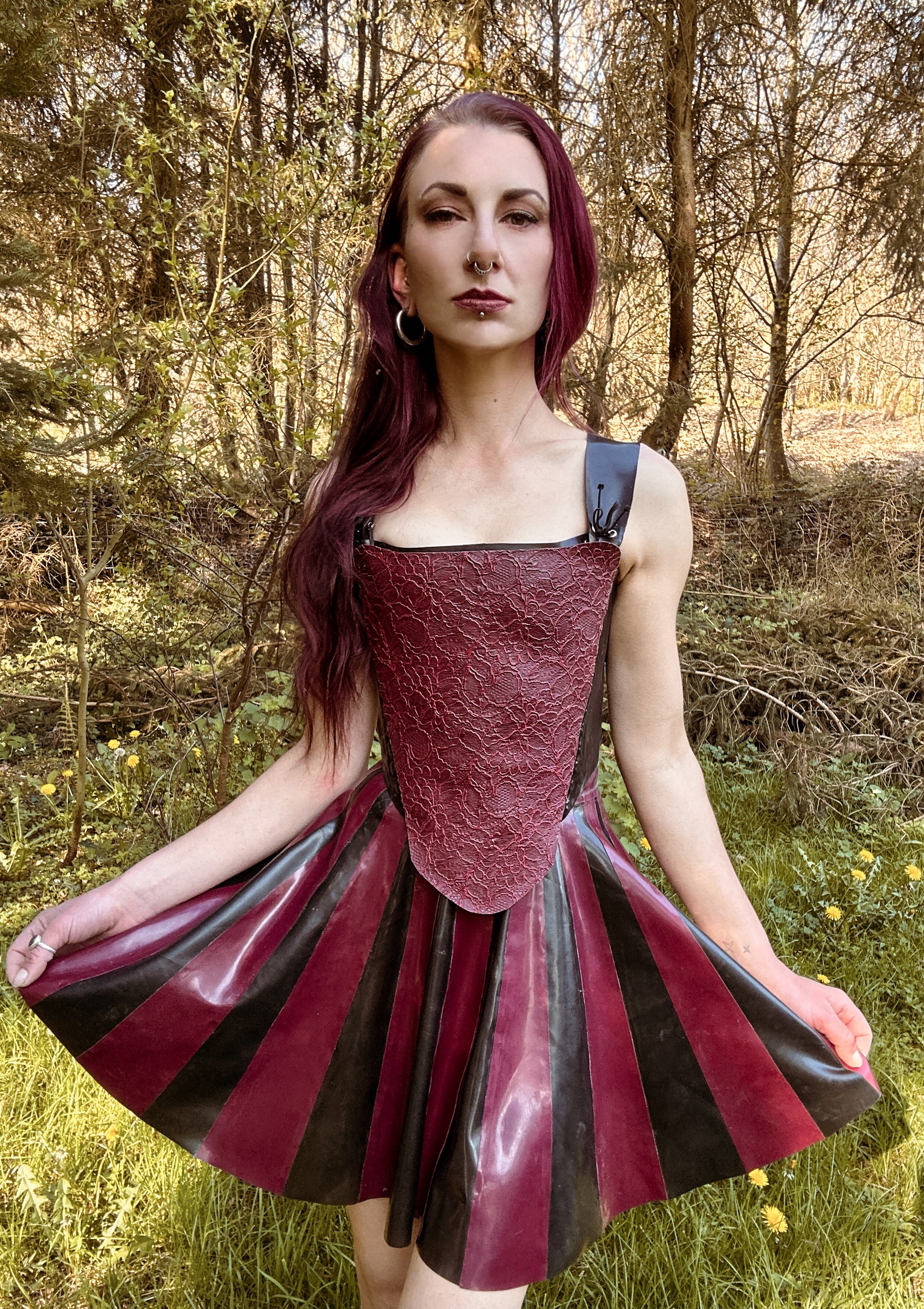 Styling of the striped latex skater skirt paired with a cropped top