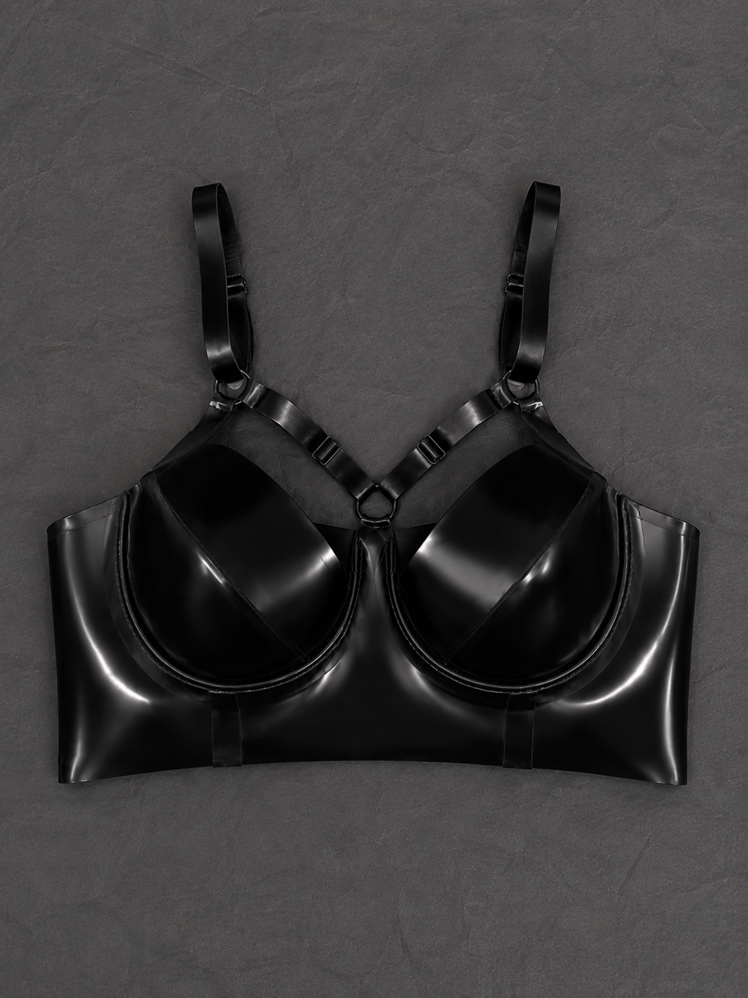 Close detail of the underwired cups on the latex harness bra