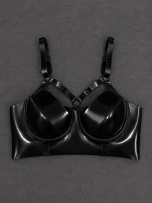 Close detail of the underwired cups on the latex harness bra