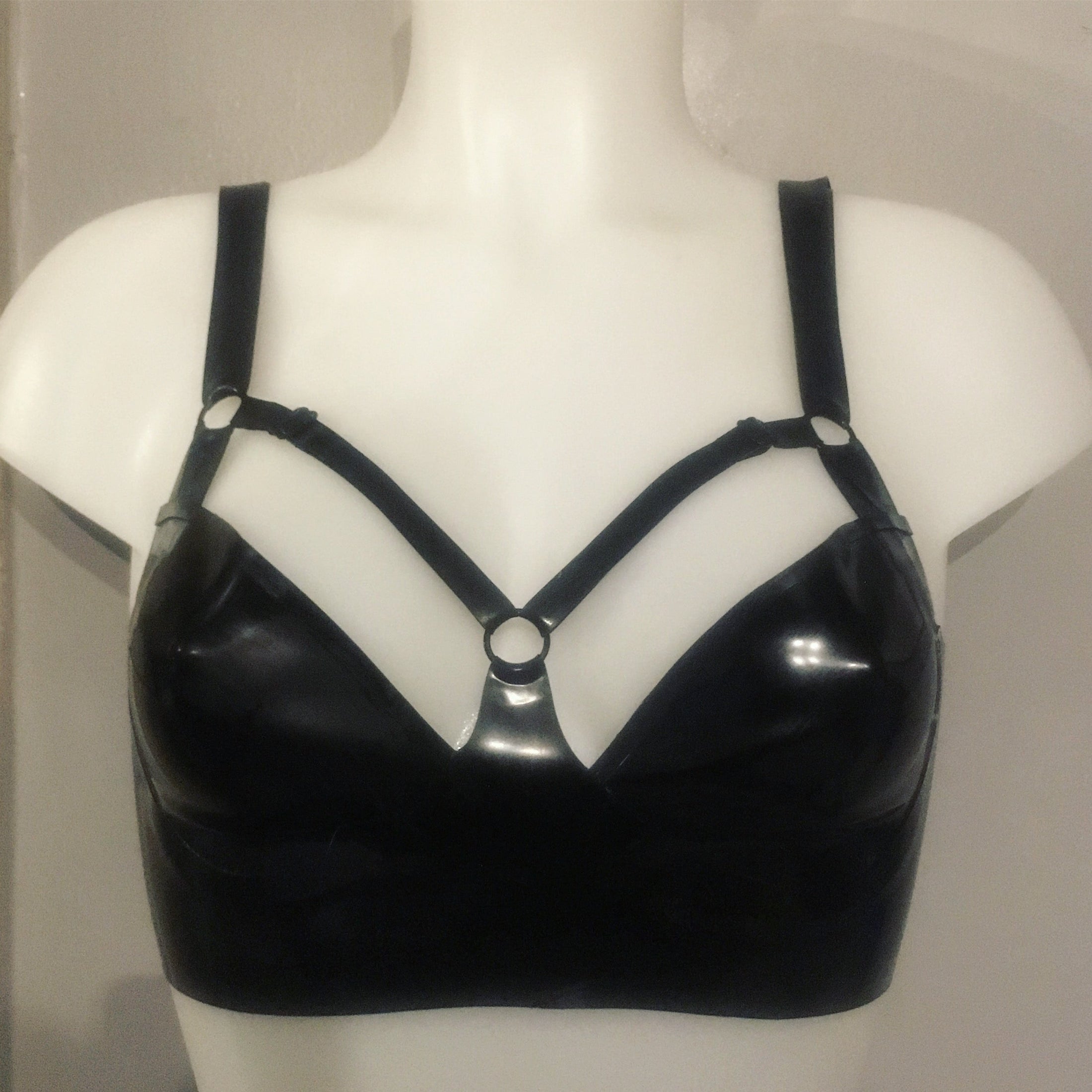 Close detail of the harness detailing on the underwired latex bra