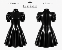 Styling of the latex swing dress showing the movement of the swing skirt