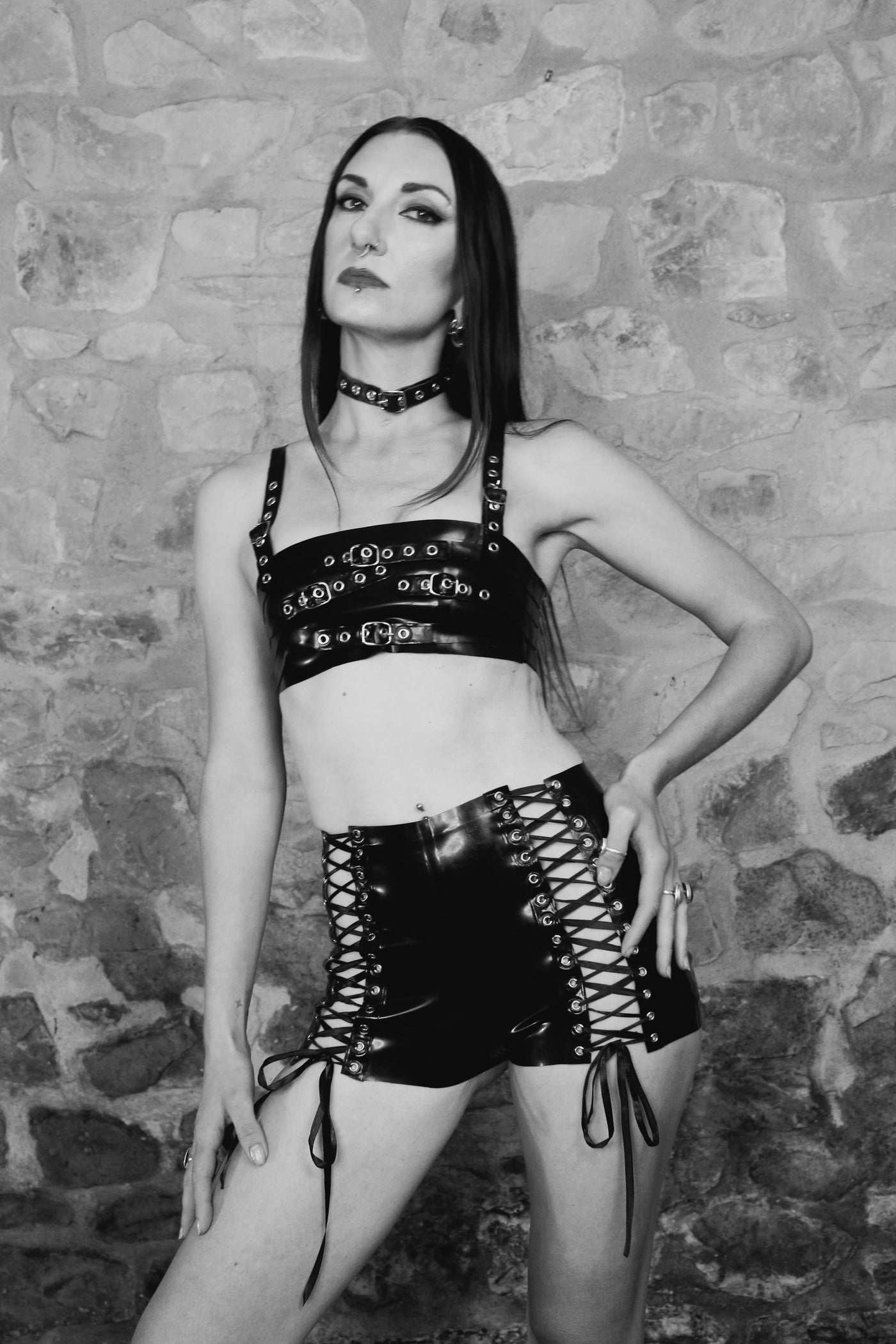 Eustratia custom length latex shorts with eyeleted lace-up detail and black ribbon