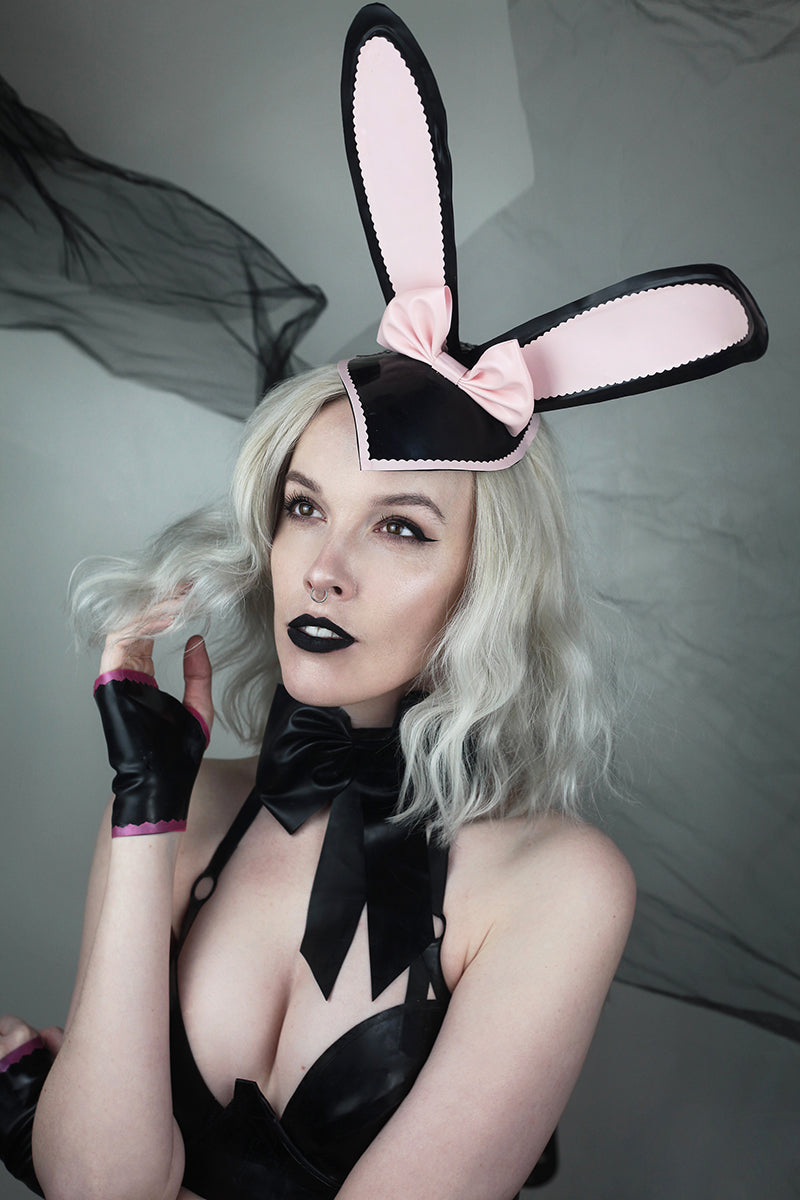 Eustratia pose-able latex bunny ears fascinator adorned with a latex bow and hair clips