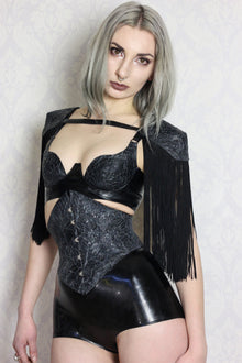 Styling of the shaped latex-lace corset with textured finish