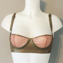 Detail of the structured underwired cups on the latex balconette bra