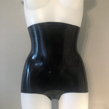 Fit and coverage detail of the high waisted latex hotpants briefs