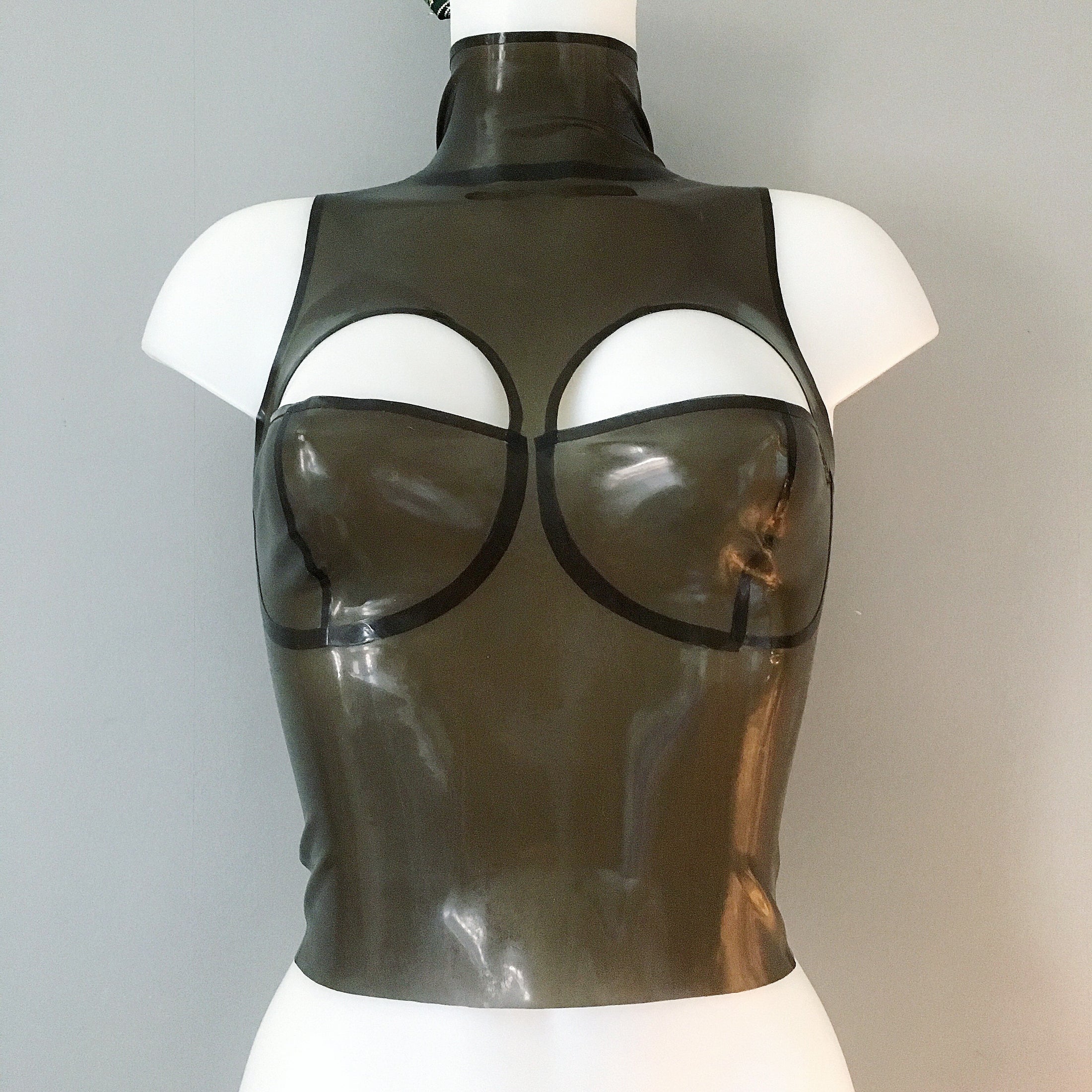 Styling of the high neck latex cup top with cut out and balconette cups