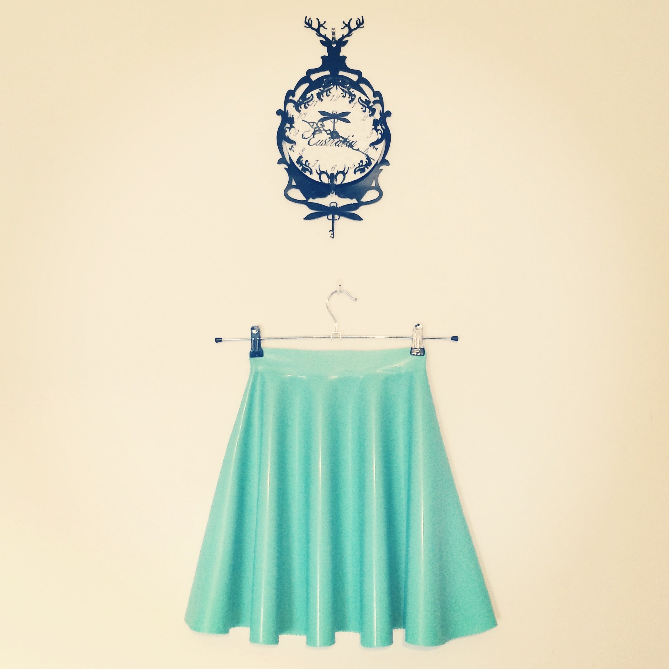 Styling of the versatile floaty latex skater mini skirt with waistband