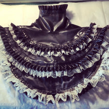 Detail of the double pleated latex and lace trim on the ruff collar