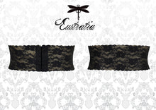 Texture detail of the translucent latex-lace on the wide waist belt