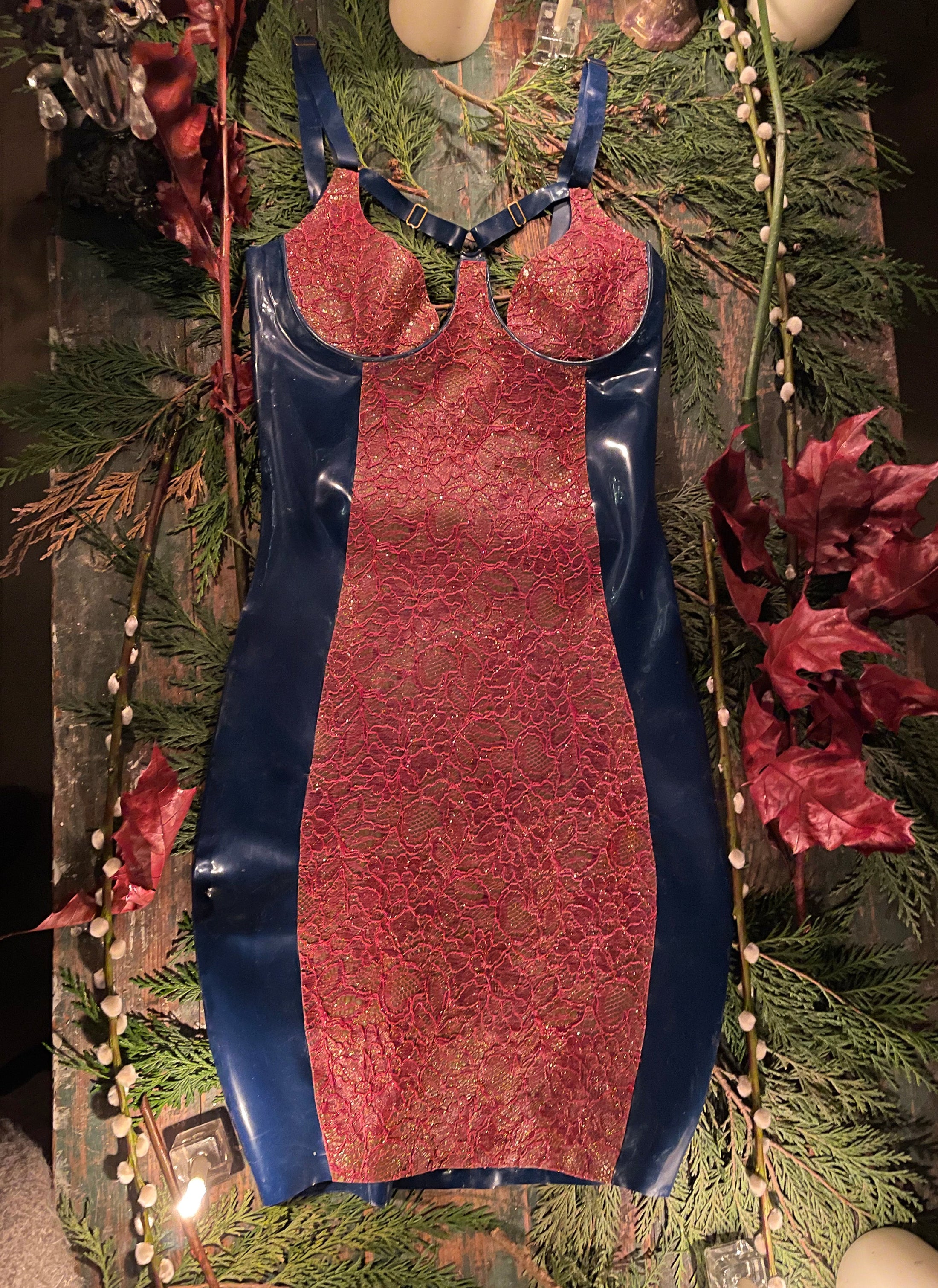 Texture detail of the signature latex-lace on the cups and centre panel of the Lyra dress