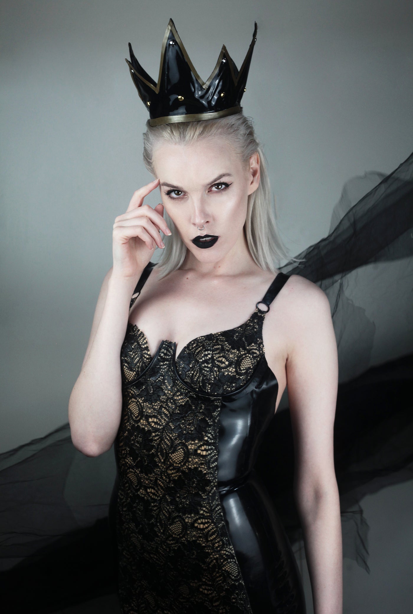 Close detail of the shaped underwired latex-lace cups on the dress