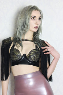 Detail of the adjustable halter strap on the latex-net plunge bra