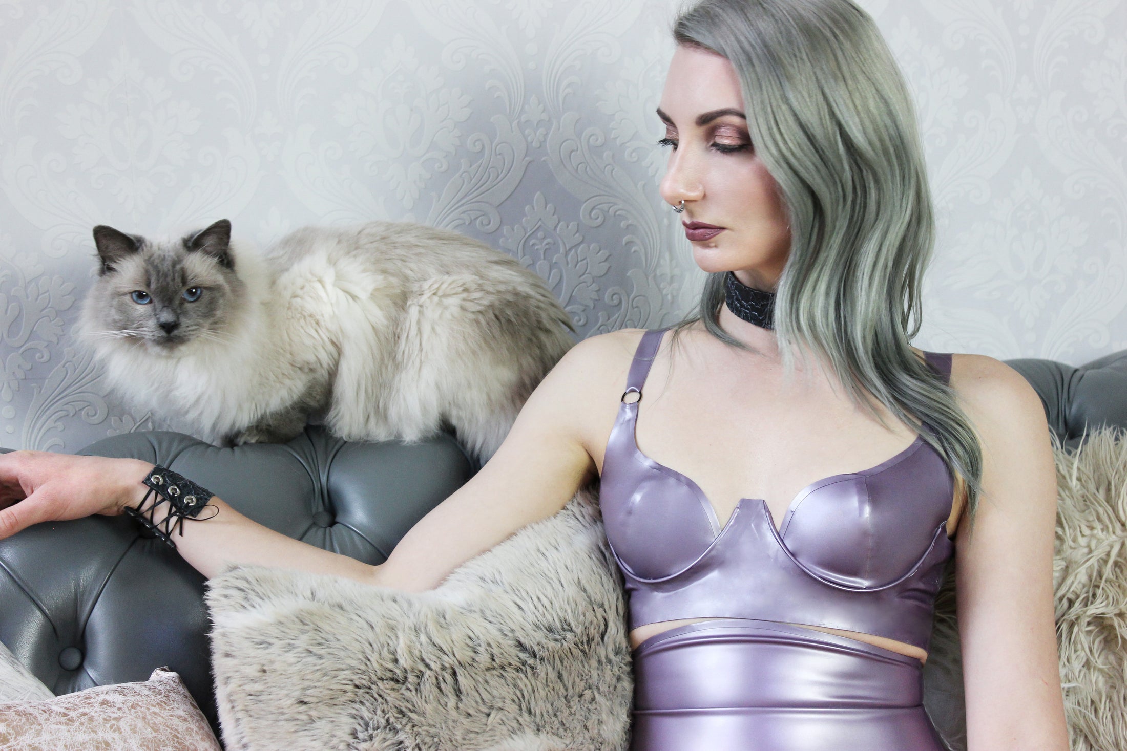 Detail of the adjustable straps and shaping on the curvy cup latex bra