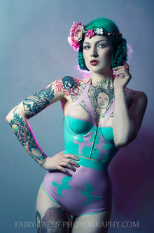 Styling of the high-waisted latex briefs with unicorn appliques